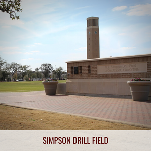 Looking onto Simpson Drill Field, featuring the bandstand, and a tree lined walkway that travels all the way around the field.